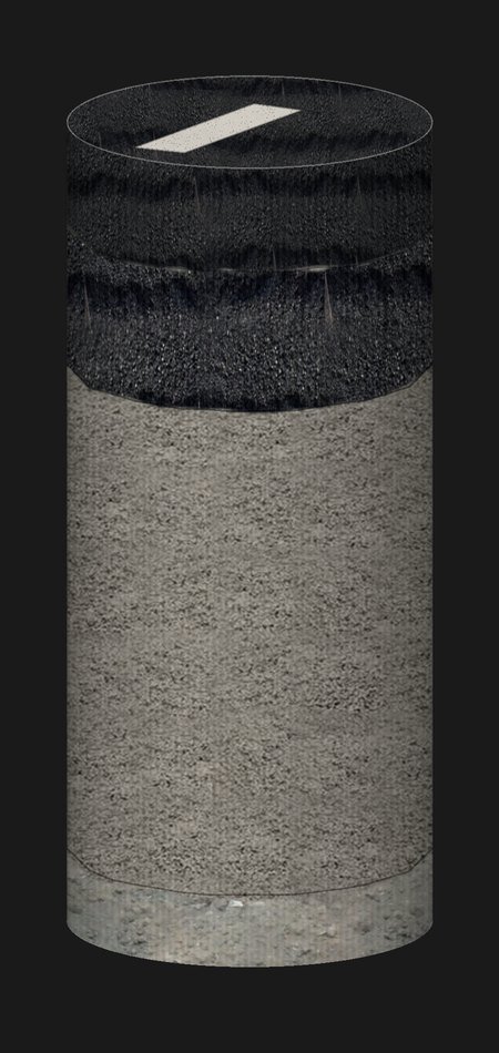 A cut core cylinder: a painted stripe on the black surface, a thin dense top lift, a coarser binder lift, and a deep bed of gray crushed stone over brown soil.